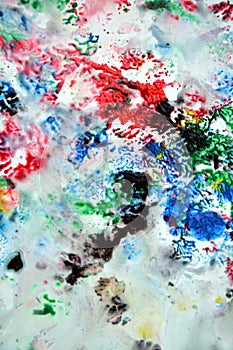 Sparkling red green black gray blue pink colors and hues. Abstract wet paint background. Painting spots.