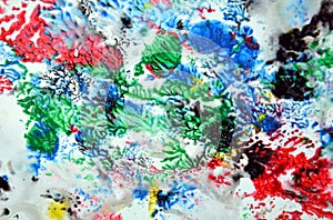 Sparkling red green blue pink colors and hues. Abstract wet paint background. Painting spots.