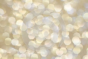 Sparkling white with glittering gold abstract background.