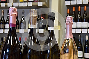 Sparkling wine bottles in wine store and ready for home delivery, restaurant, cafe, bar