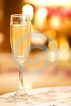 Sparkling Wine Glass or champagne on Marble Table