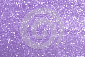 Sparkly glitter, lilac background bokeh effect photo