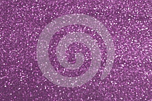 Sparkly glitter, purple background bokeh effect photo
