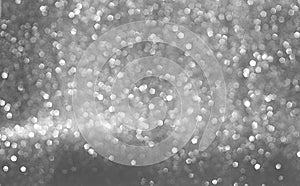 Sparkly glitter, silver background bokeh effect photo