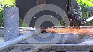 Sparks from Cutting Metal Bars (3)