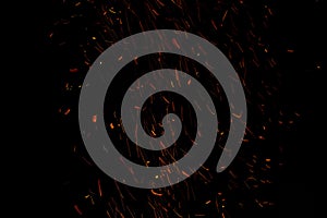 Sparks and fire on a black background
