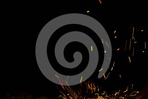 Sparks and fire on a black background