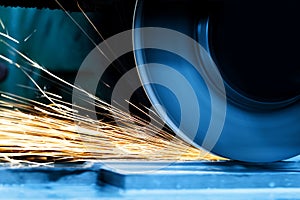 Sparks from grinding machine. Industrial, industry photo