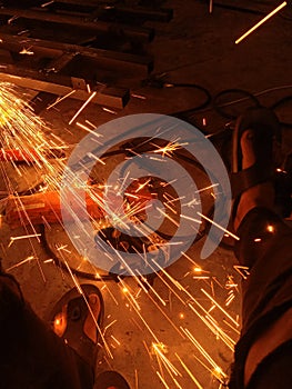 Sparks from grinding and welding machines