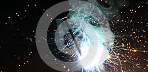 Sparks and jets of smoke when welding