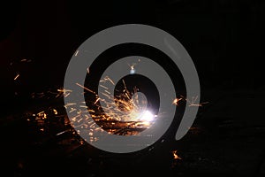 Sparks from a metal cutting machine