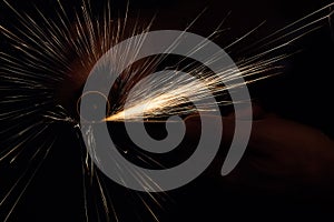 Sparks from a saw