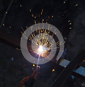 Sparks from welding at the construction site