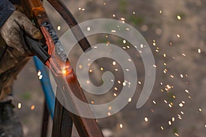 Sparks from welding work as background