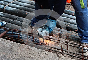 Sparks when worker cut iron with a flexible