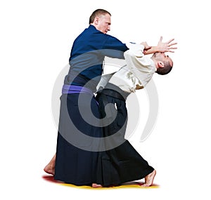 Sparring of two jujitsu fighters photo