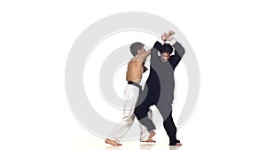 Sparrynh taekwondo and wushu or karate man. on a