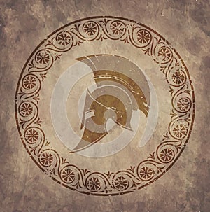 Spartan helmet in style grunge, is issued in antique Greek style. photo