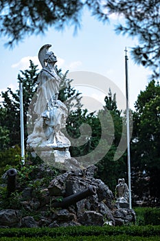 Spartan mothers tell their sons, â€œWith your shield or on itâ€. Statue of the city of Ioannina with the inscription `