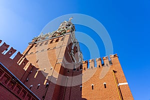 Spasskaya Tower Chiming Clock in Moscow Kremlin, Details of famous architecture building, closeup view, sunny day. photo