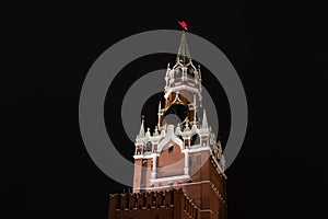 Spasskaya Tower of Moscow Kremlin at Red Square against background of the night sky in Moscow. Russia