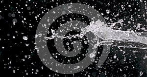 Spattering Water on a Black Background.