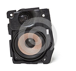 Speaker of an acoustic system an audio for playing music in a car interior on a white isolated background in a photo studio. Spare