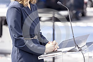 Speaker at business conference, presentation or news event