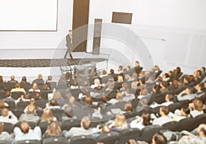 Speaker at a business convention and presentations. The audience on the large number of people