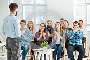 Speaker at Business Meeting in the conference hall.