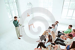 Speaker at Business Meeting in the conference hall.