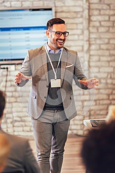 Speaker giving a talk in conference hall at business event