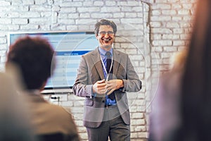 Speaker giving a talk in conference hall at business event