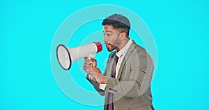 Speaker, loud and businessman shouting on a megaphone making an announcement isolated in a blue studio background