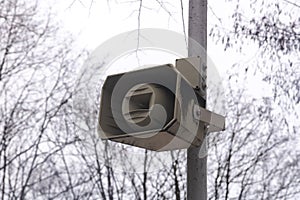 Speaker on a pole in the park