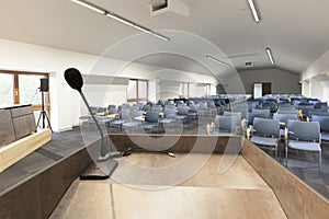 Speaker's table in Interior of a modern conference hall