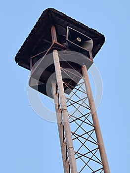 speaker tower on blue sky