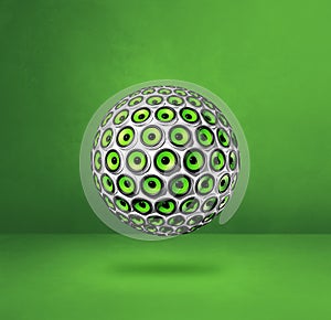 Speakers sphere on a green studio background