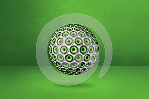 Speakers sphere on a green studio background