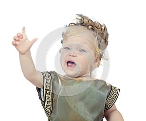 Speaking baby girl in a greek fancy dress