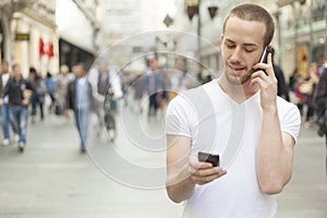 Speaking on mobile phone and second in hand