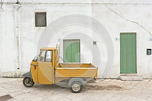 Specchia, Apulia - An old historic three wheeler in the streets