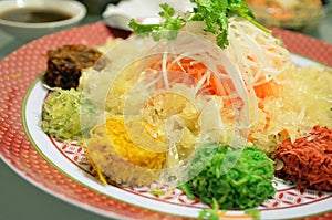 A special dish during Chinese New Year called Yusheng or Yee Sang