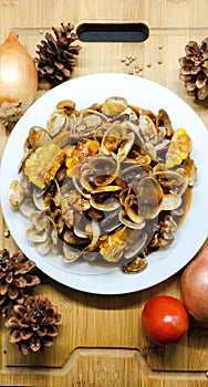 a special dish of sweet and sour seafood shellfish from Indonesia