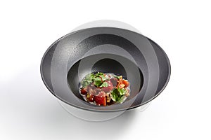 Special dishes of Pan-Asian cuisine in dark iron plate