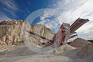 Special equipment in a quarry against a blue sky
