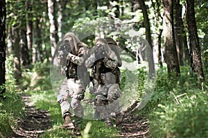 Special forces soldiers on patrol photo