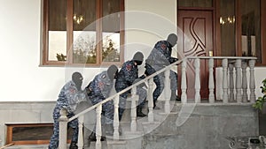 Special forces storm house