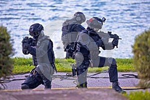 Special forces tactical team of three in action