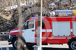 Special freight transport on the road. The fema car or fire service is on the road.